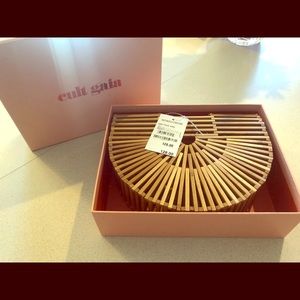 Cult Gaia bamboo wood clutch
